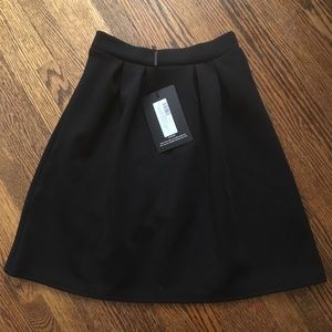 Black Pleat Mini Skirt